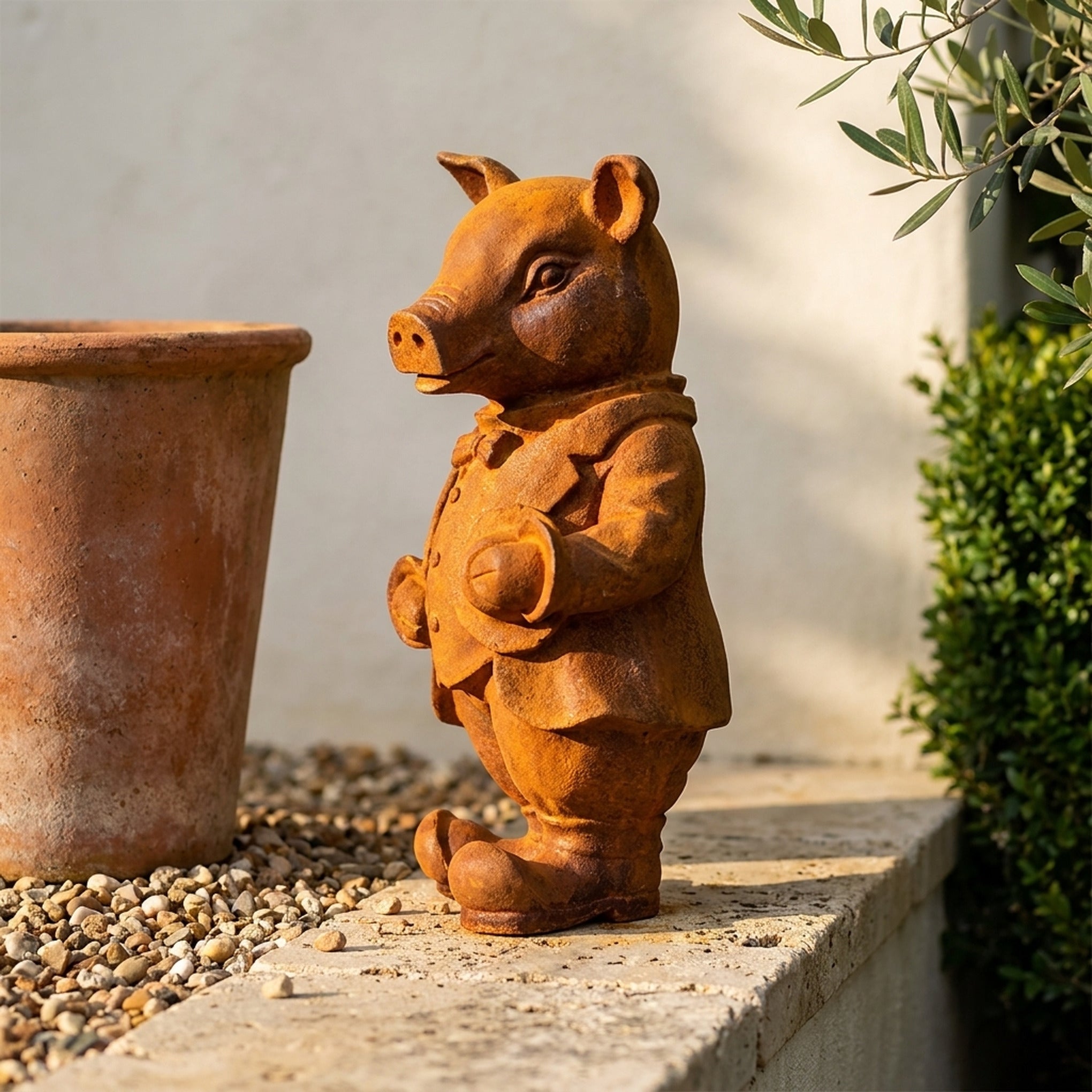 Inspector Truffles pig statue side view showing the coat and boots