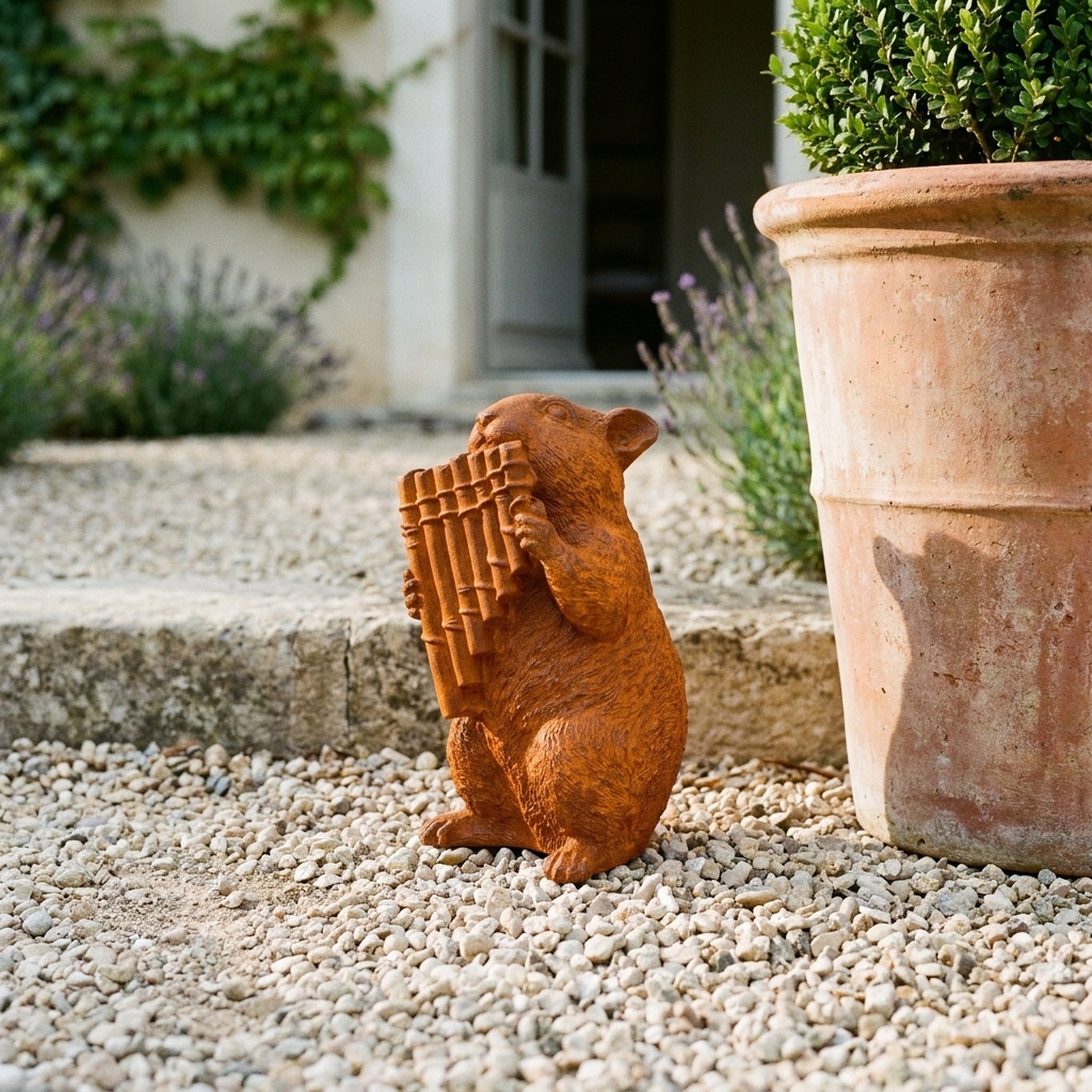 Archie dormouse statue with pan pipes front view showing the full height and finish
