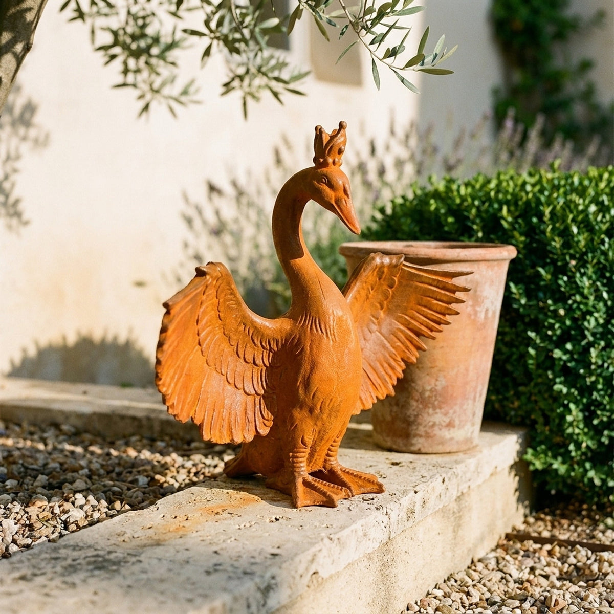 Princess Evangeline crowned goose statue showing the raised wings and beaded crown