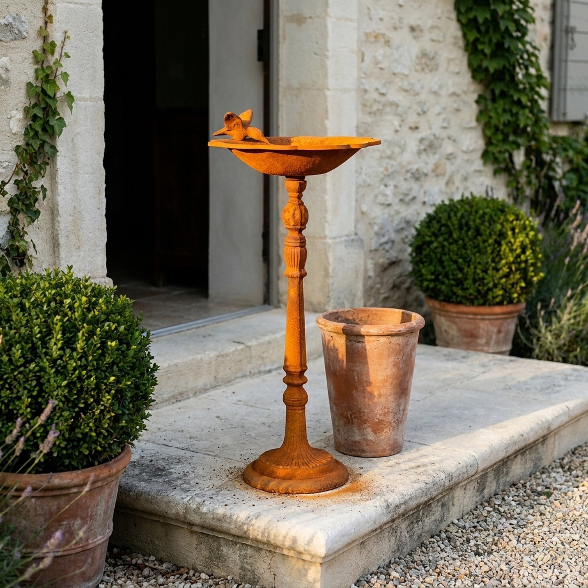 The Willowmere pedestal bird bath front view showing the full height and finish