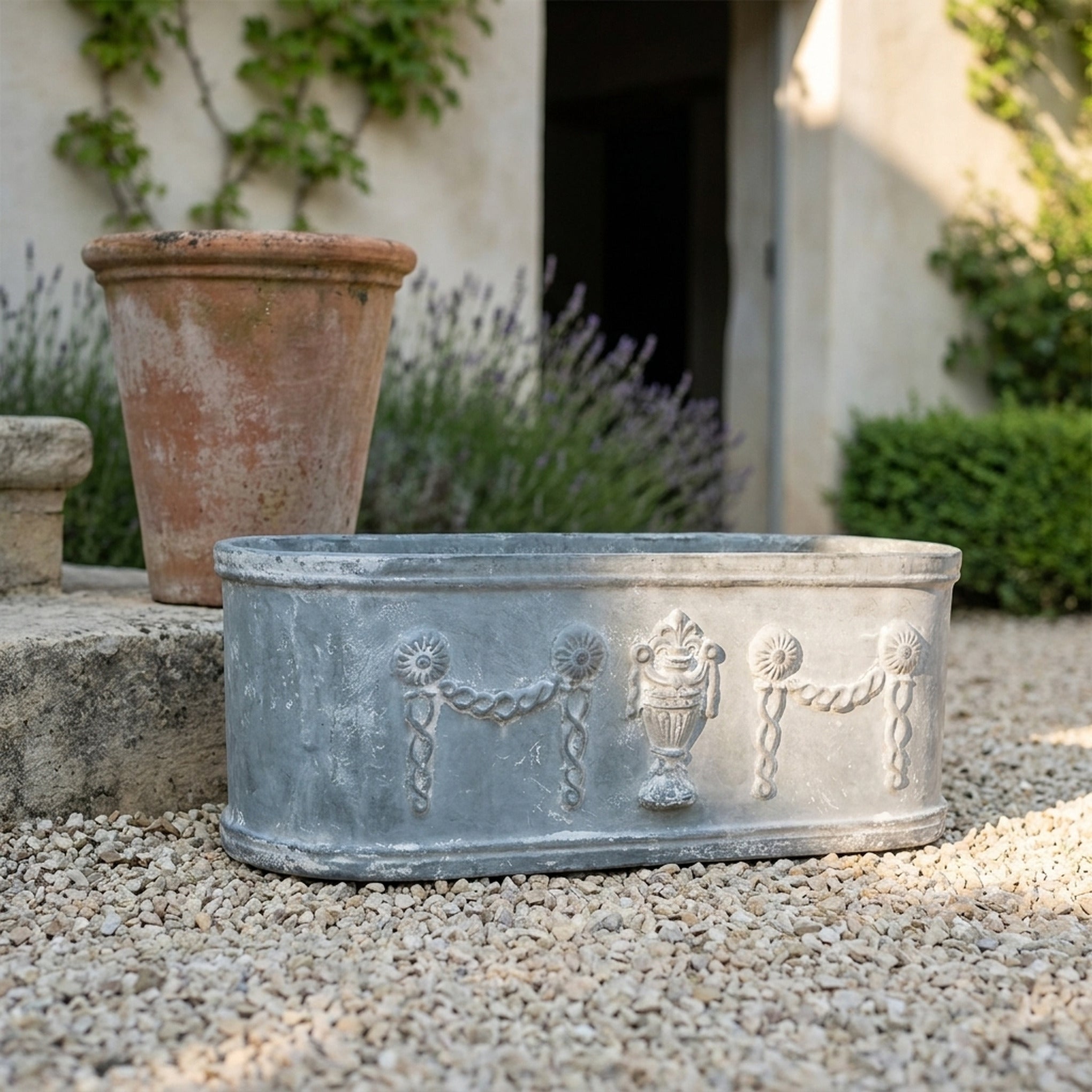 The Heritage Planter Grey close detail of the weathered grey patina across the mouldings