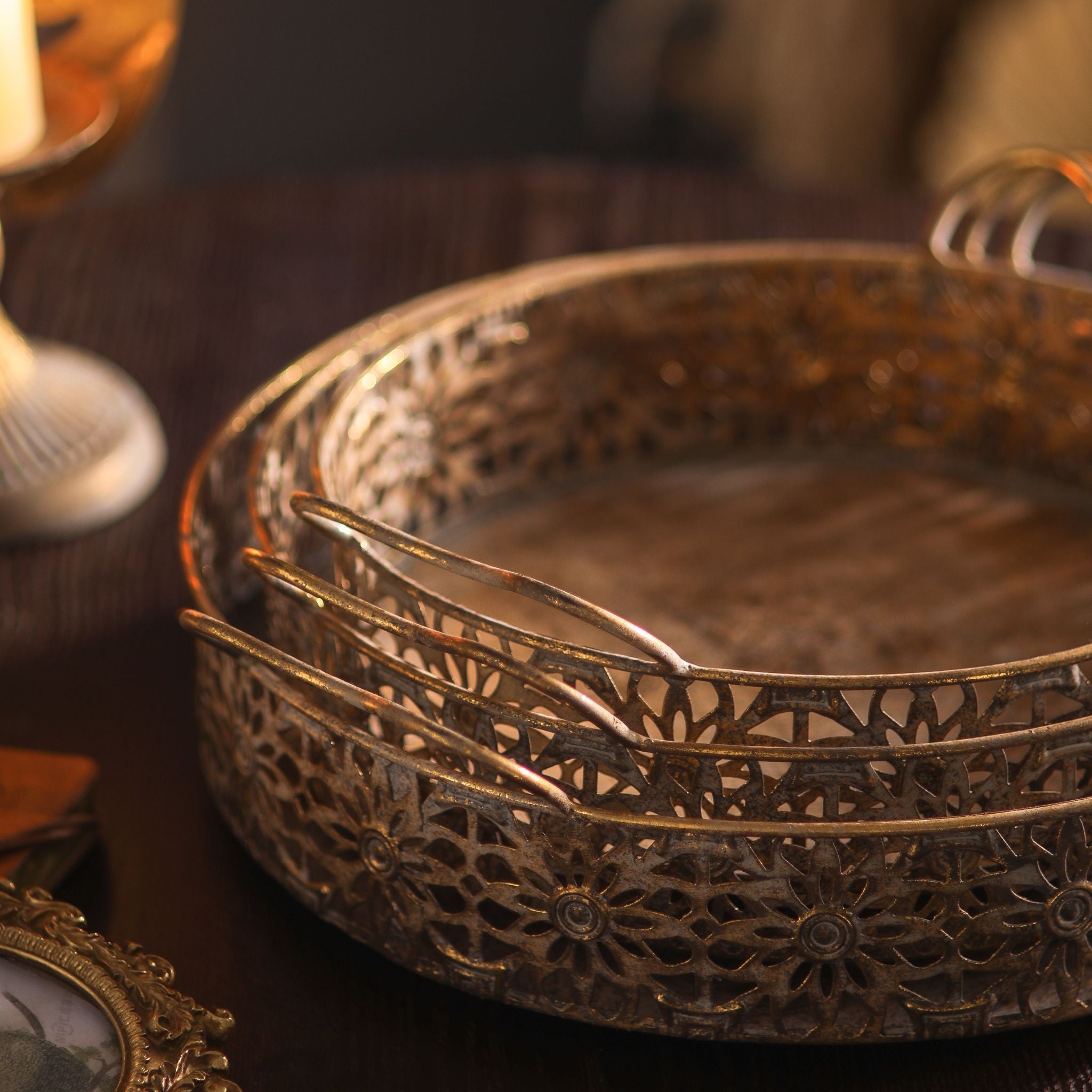 Paolo tray set close-up detail of the floral fretwork gallery sides and whitewashed gold finish