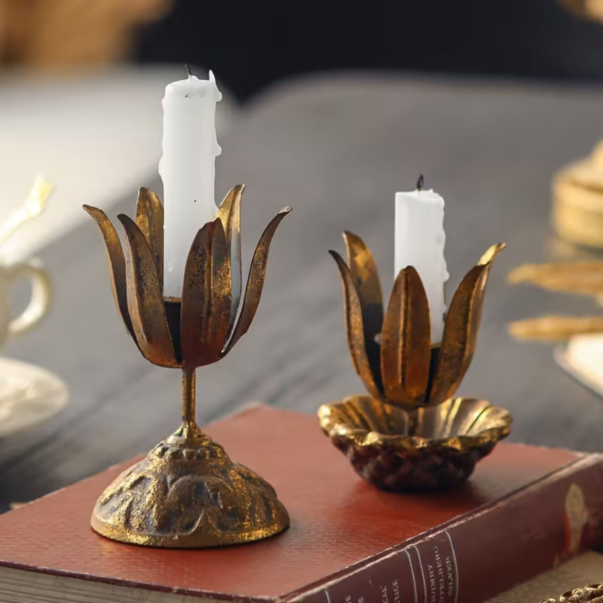 Massimo gilded flower candle holder pair unlit showing the petal detail