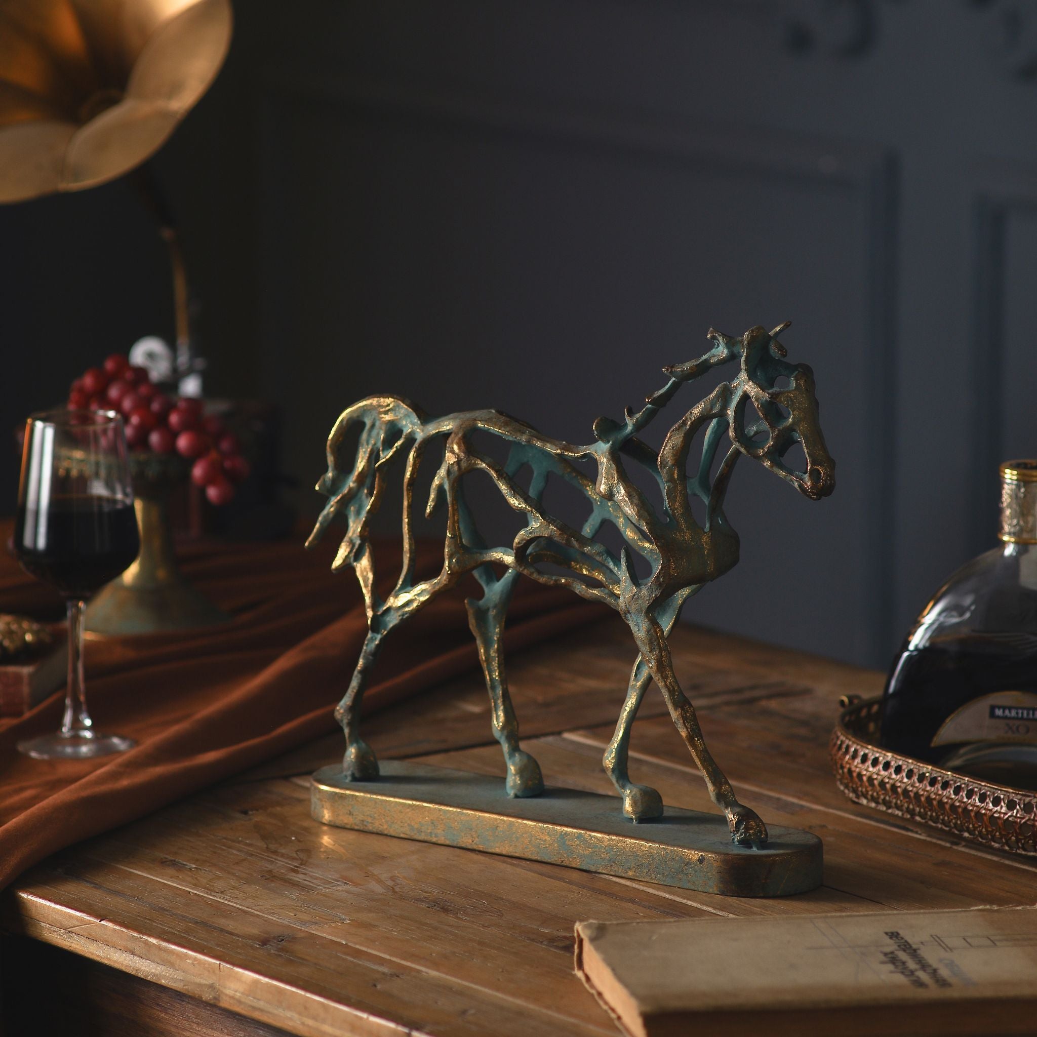 Jules horse sculpture styled on a timber table with a gramophone and decanter