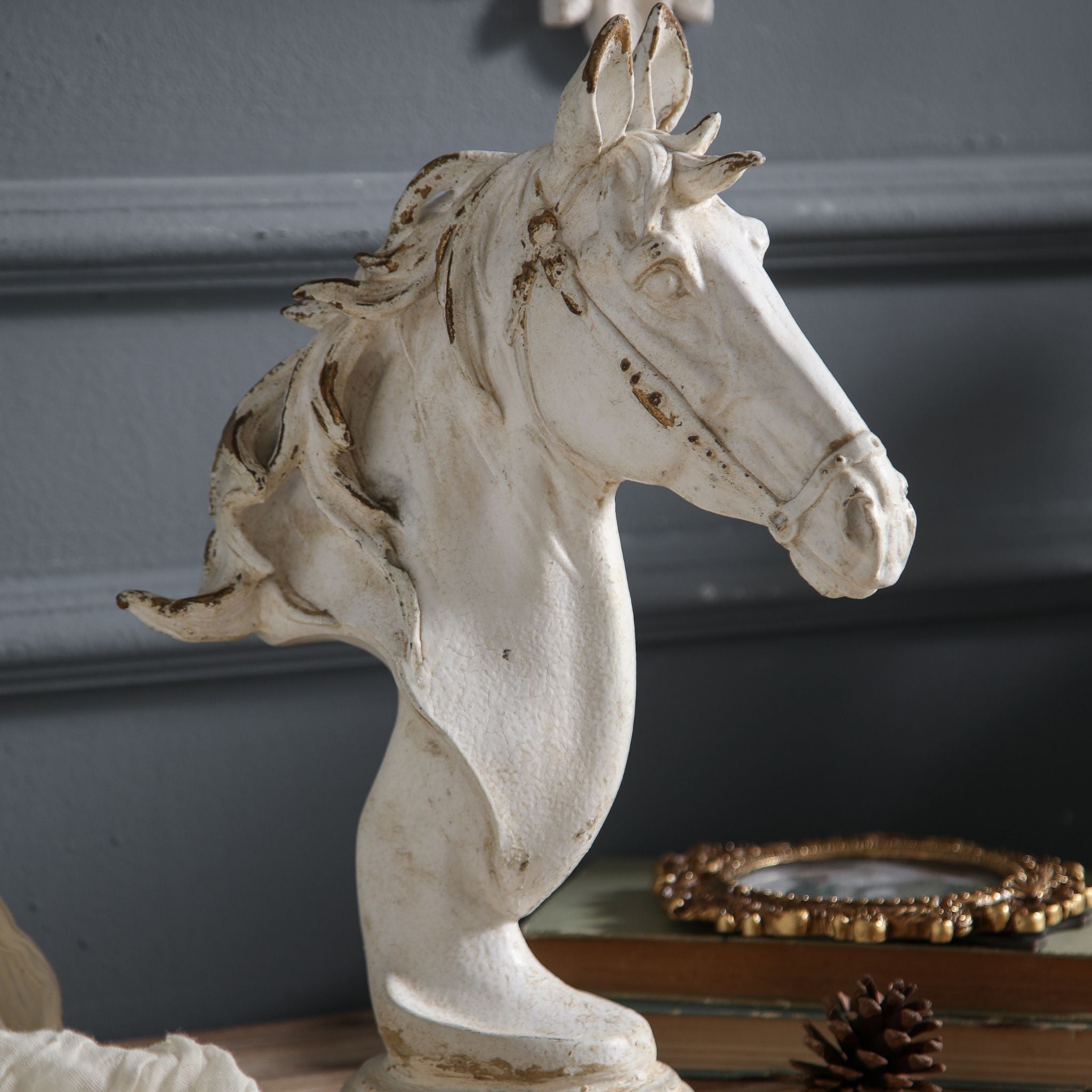 Close-up of Apollon horse head bust showing the flowing sculpted mane detail, soft distressed whitewash finish, and warm undertone chips along the mane edges