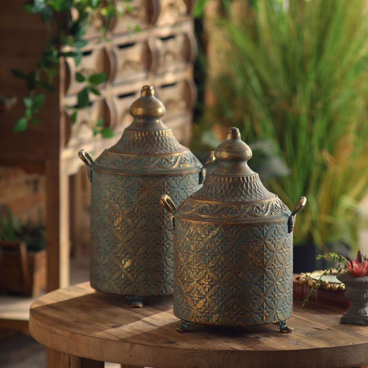 Aria antique gold lidded canister, the taller one at left, shown beside the shorter Agathe canister (sold separately).