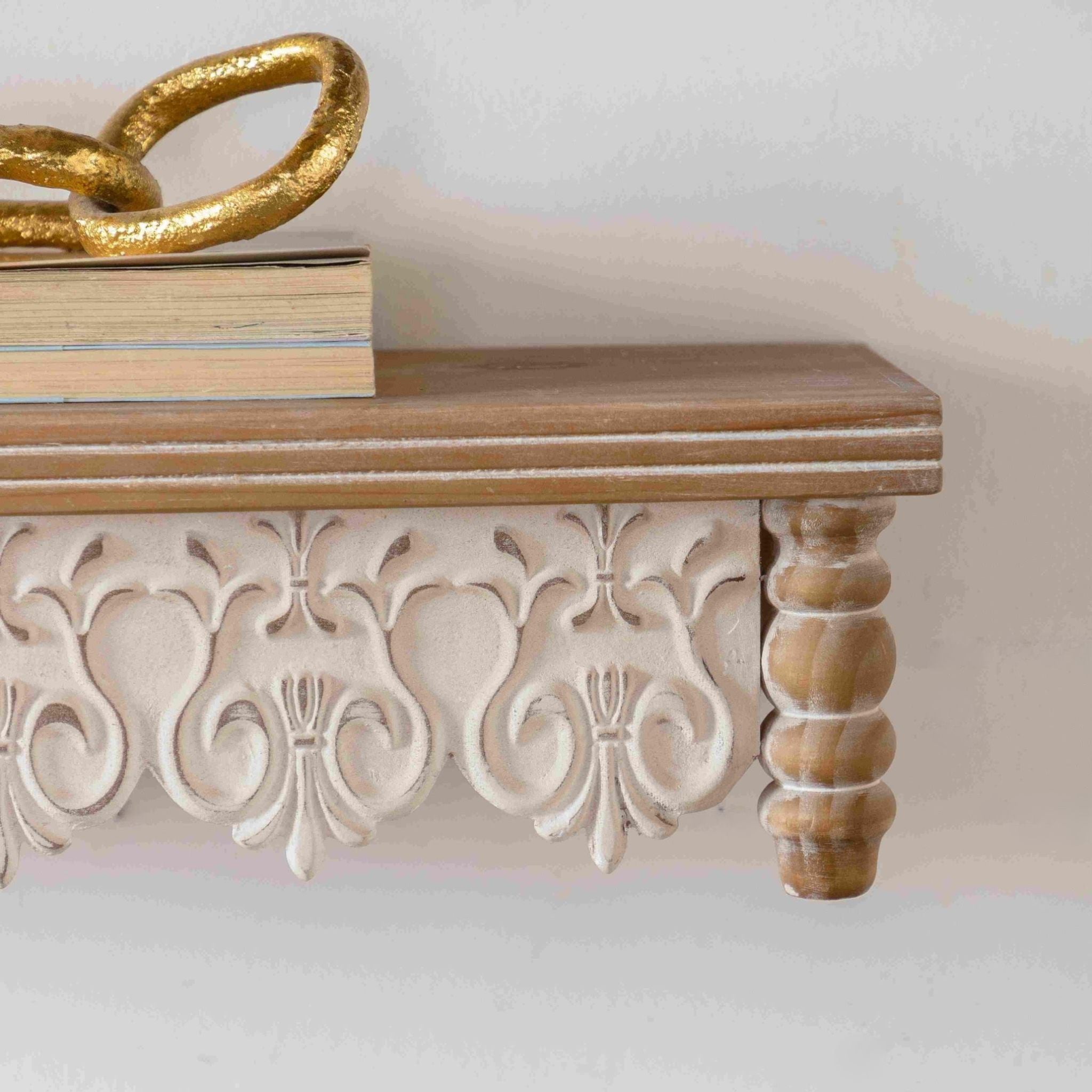 Ariette wall shelf close-up of the scrolled carved-look apron and turned spindle end