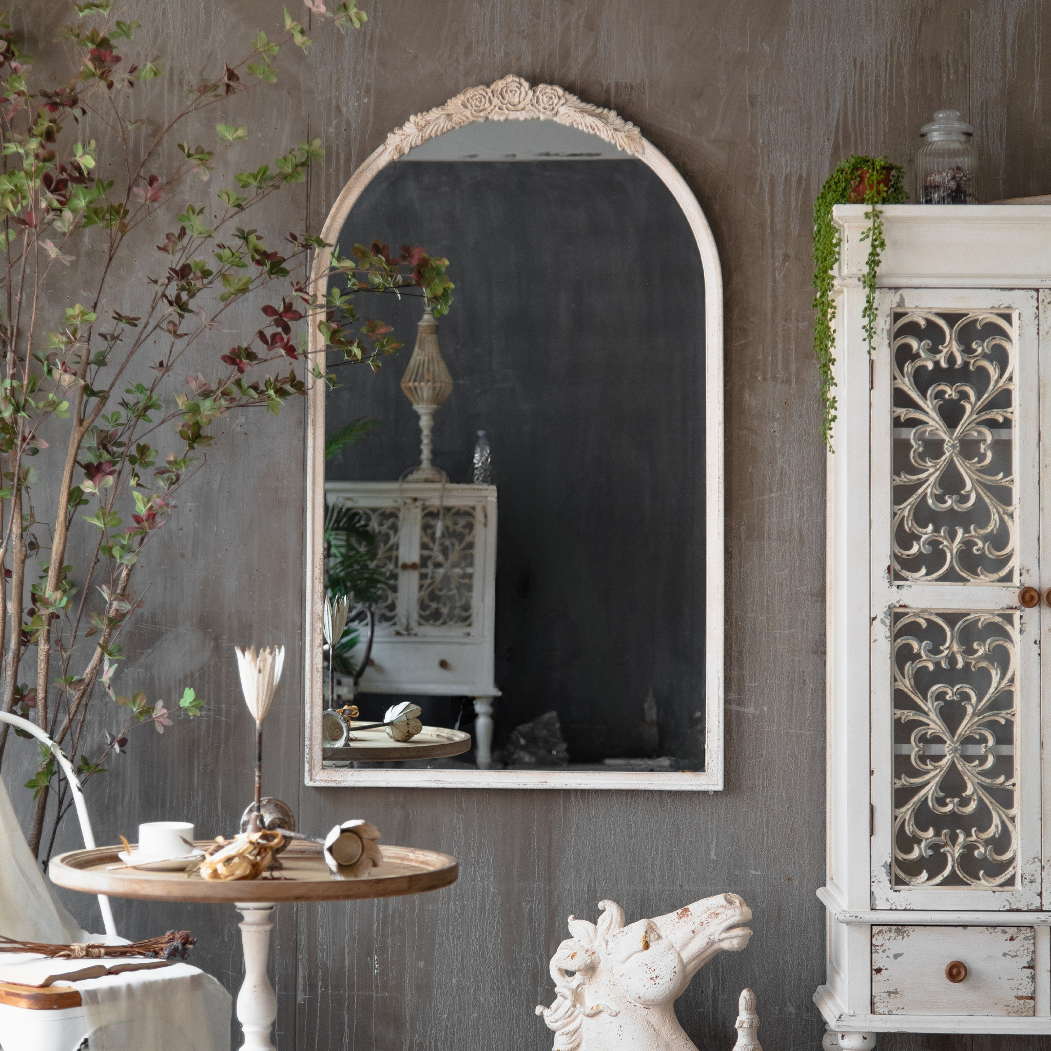 Camille French Provincial arched wall mirror with distressed timber frame and rose crown