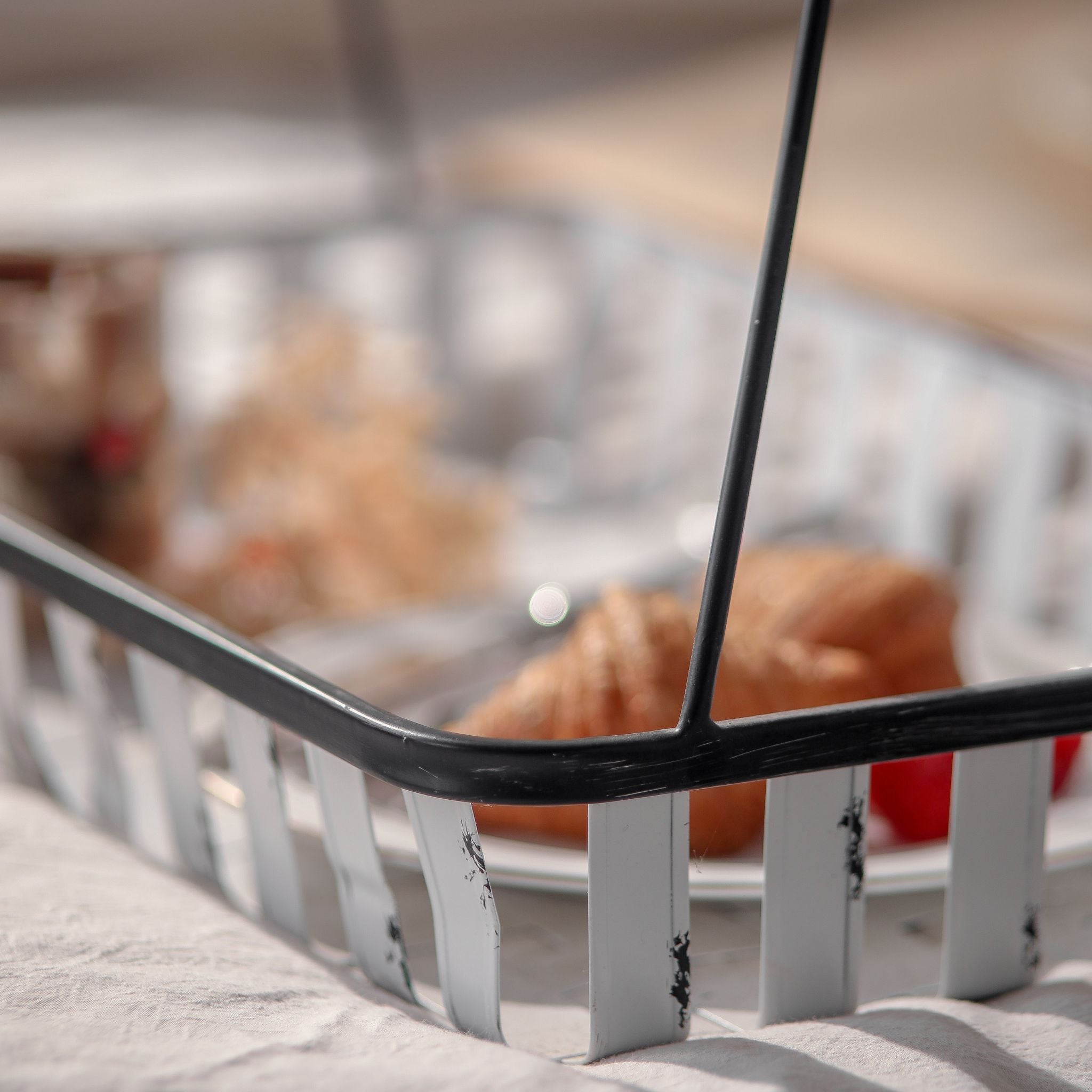 Chantal metal carry basket styled as a breakfast caddy, food and props not included