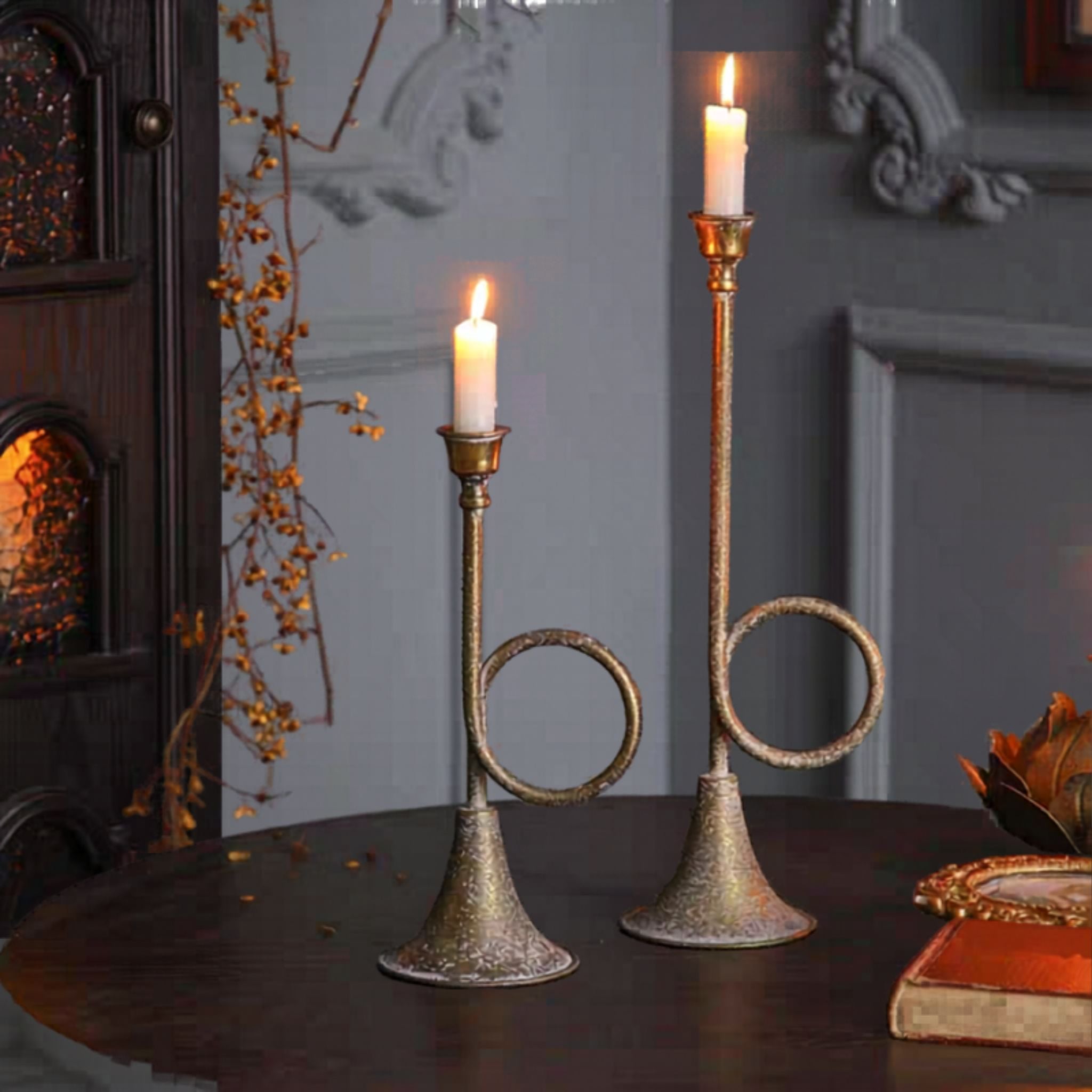 Arnaud shown beside the shorter Renée holder, both lit, sizes sold separately.