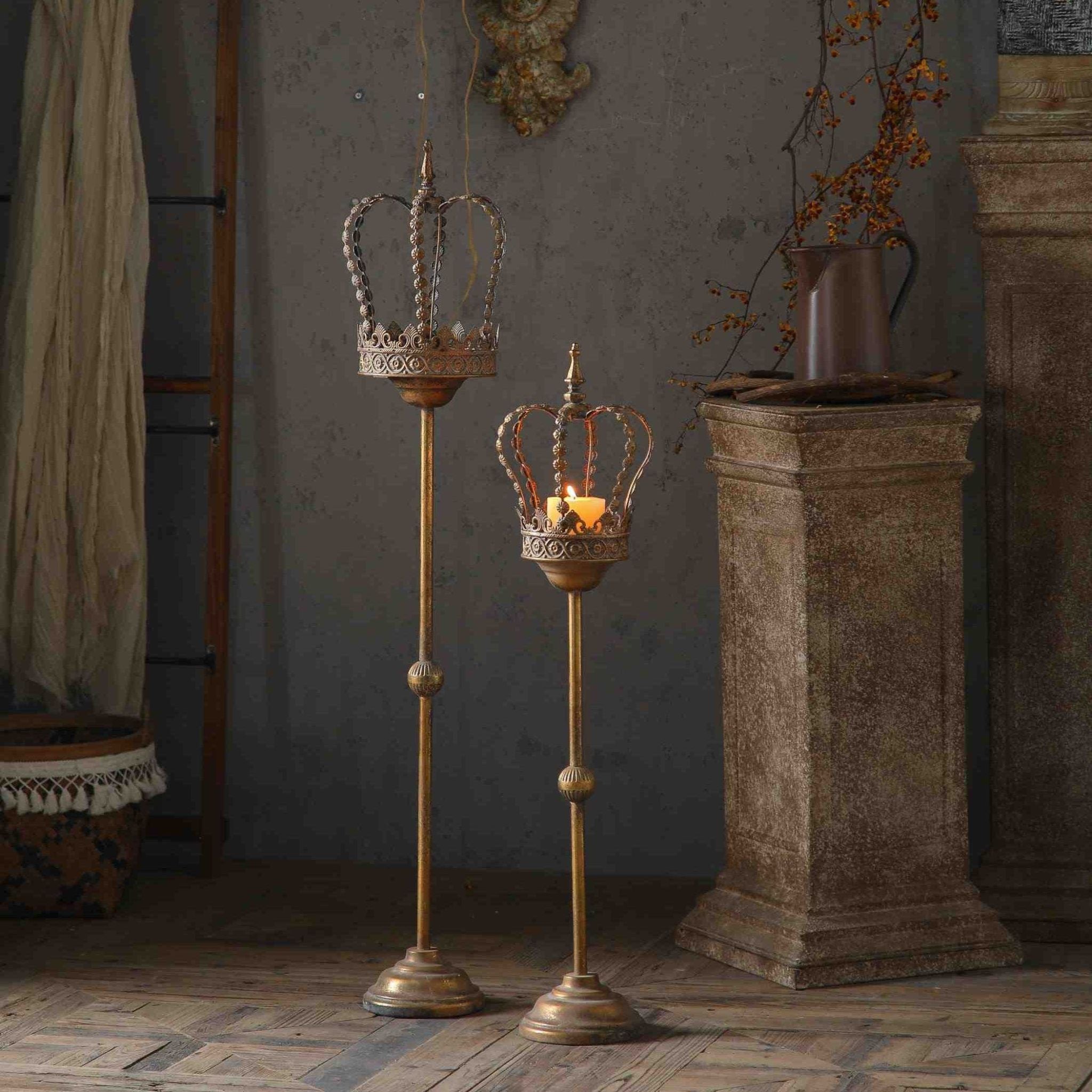 Two crown candle stands at different heights, shorter companion sold separately