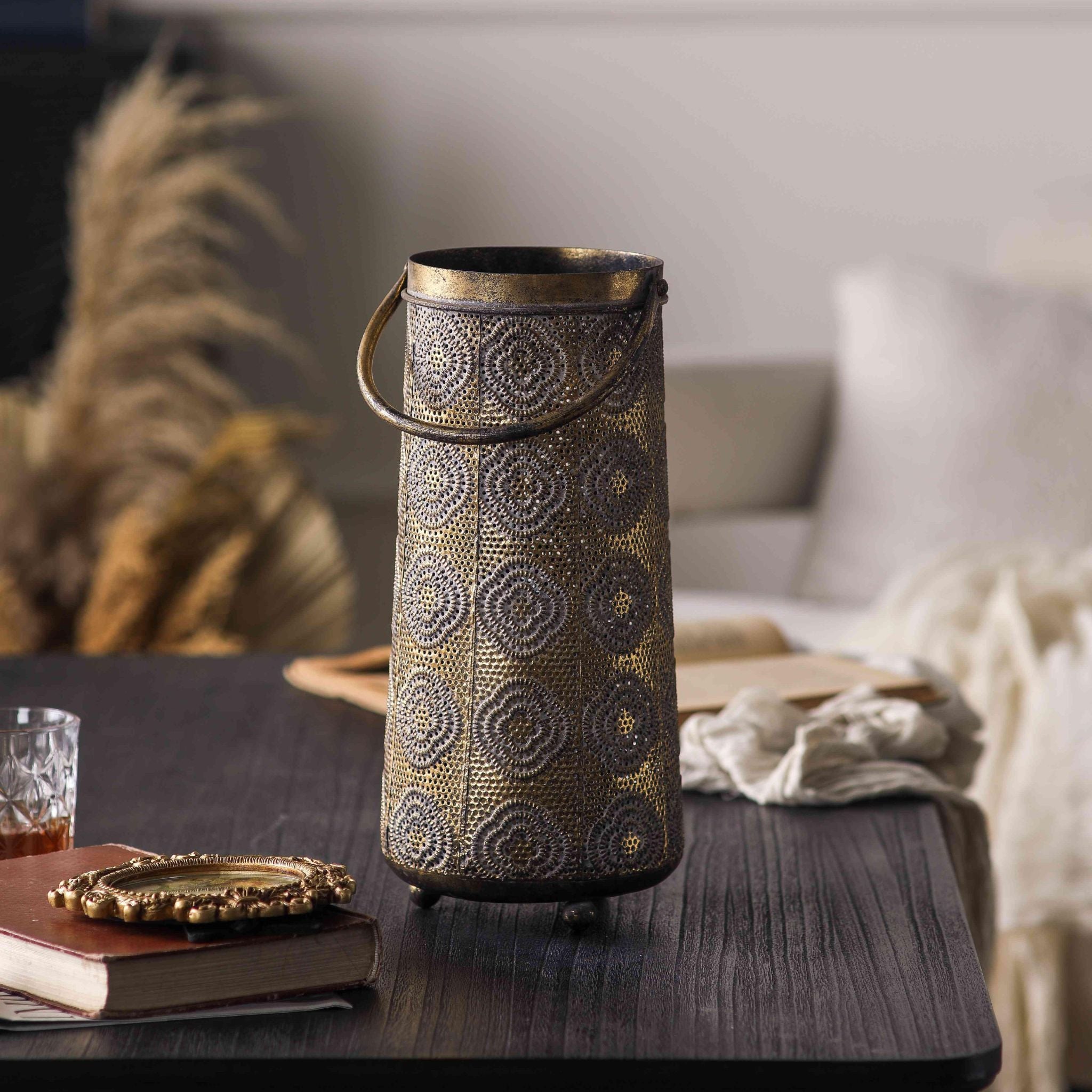 Jasmine antique gold pierced lantern full front view showing the tapered body and swing handle

