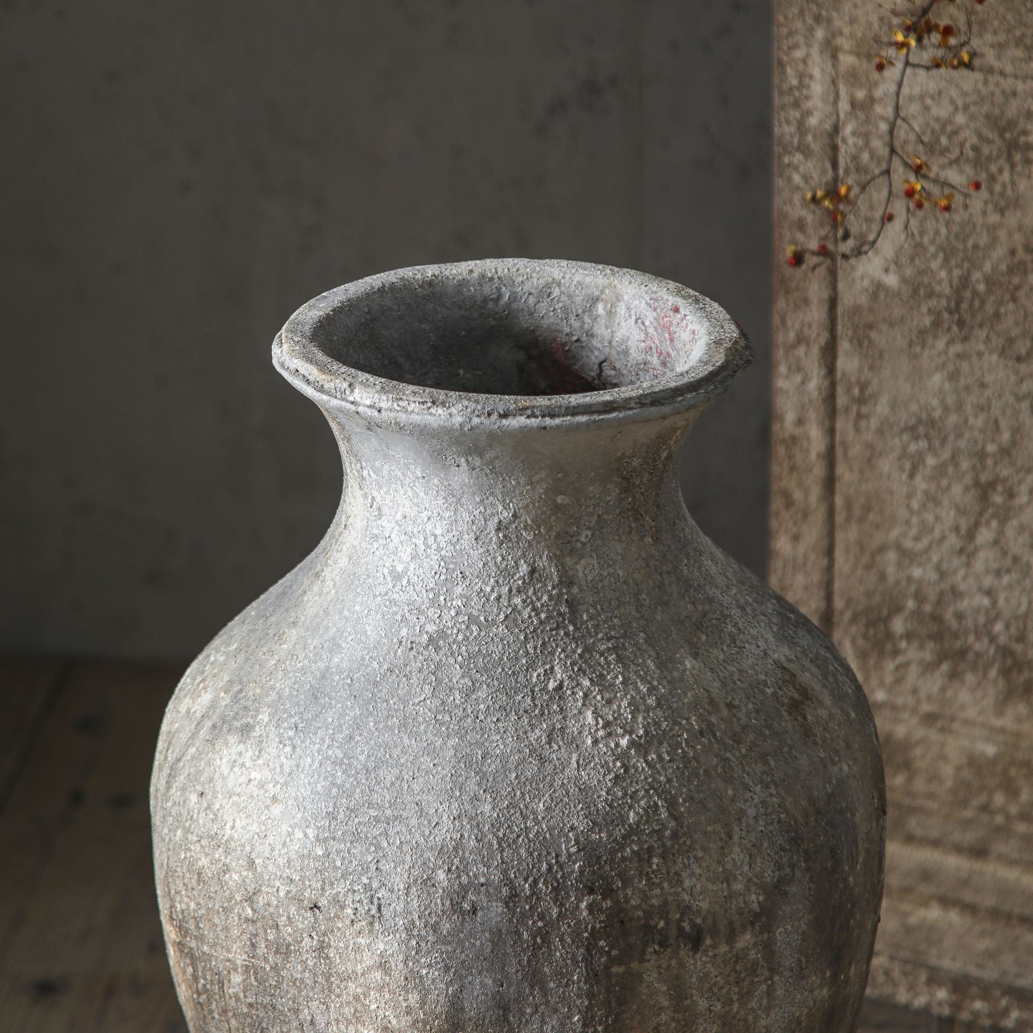 Lionel floor vase close-up of the flared rim and weathered grey texture