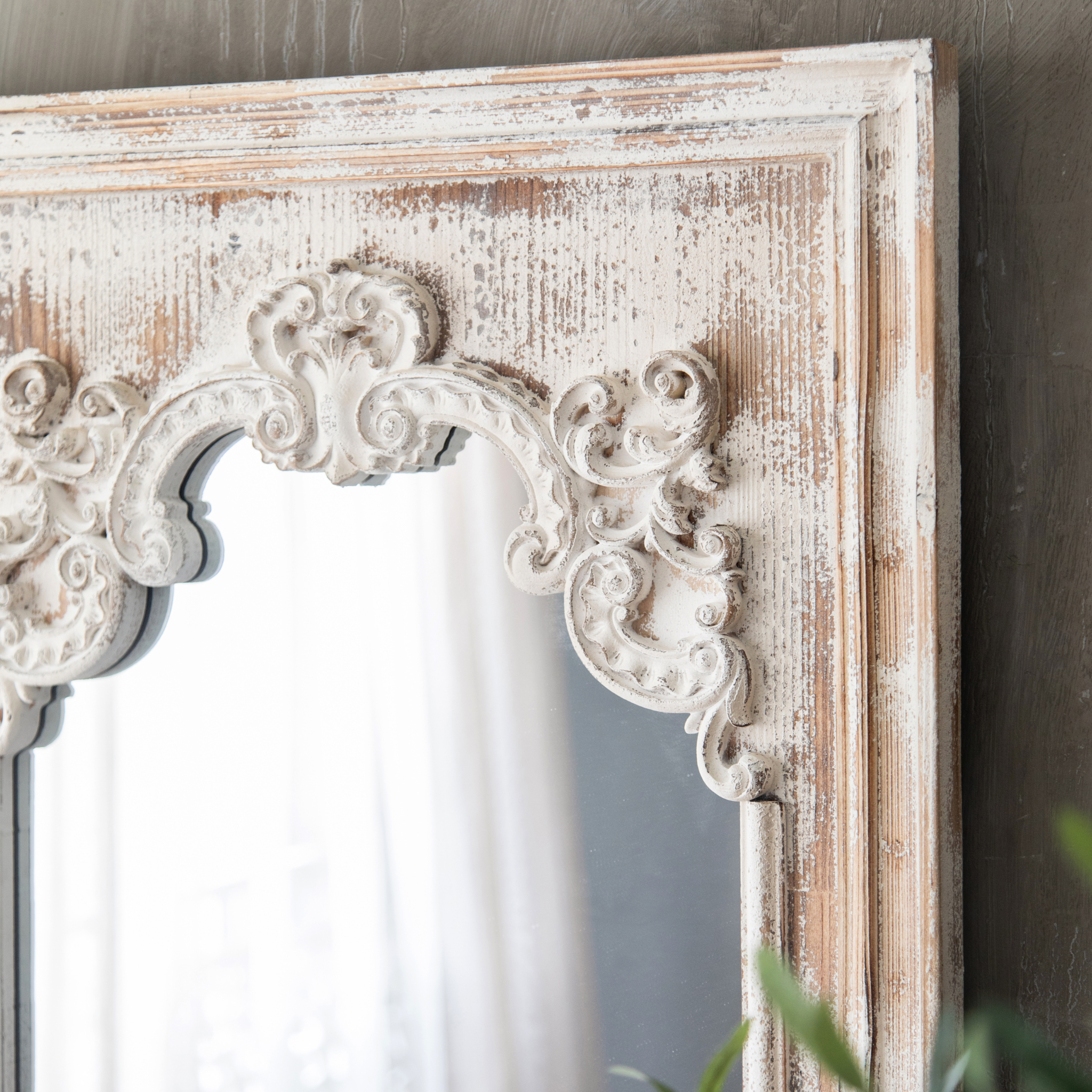 Top scrollwork ornament detail of the Lucien French Provincial mirror
