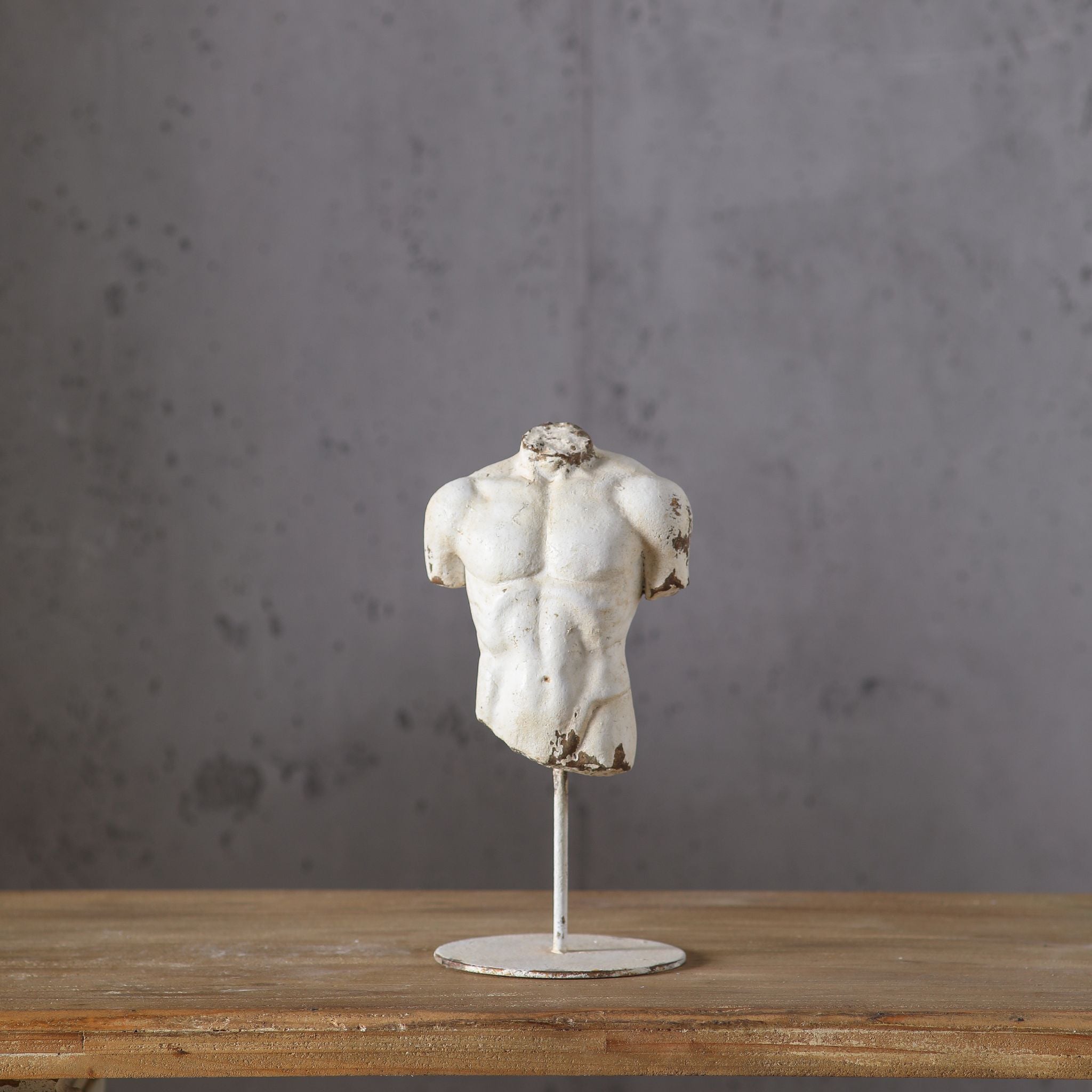 Cassius upright distressed white male torso sculpture on slim iron stand, classical Greek figure. Hero.