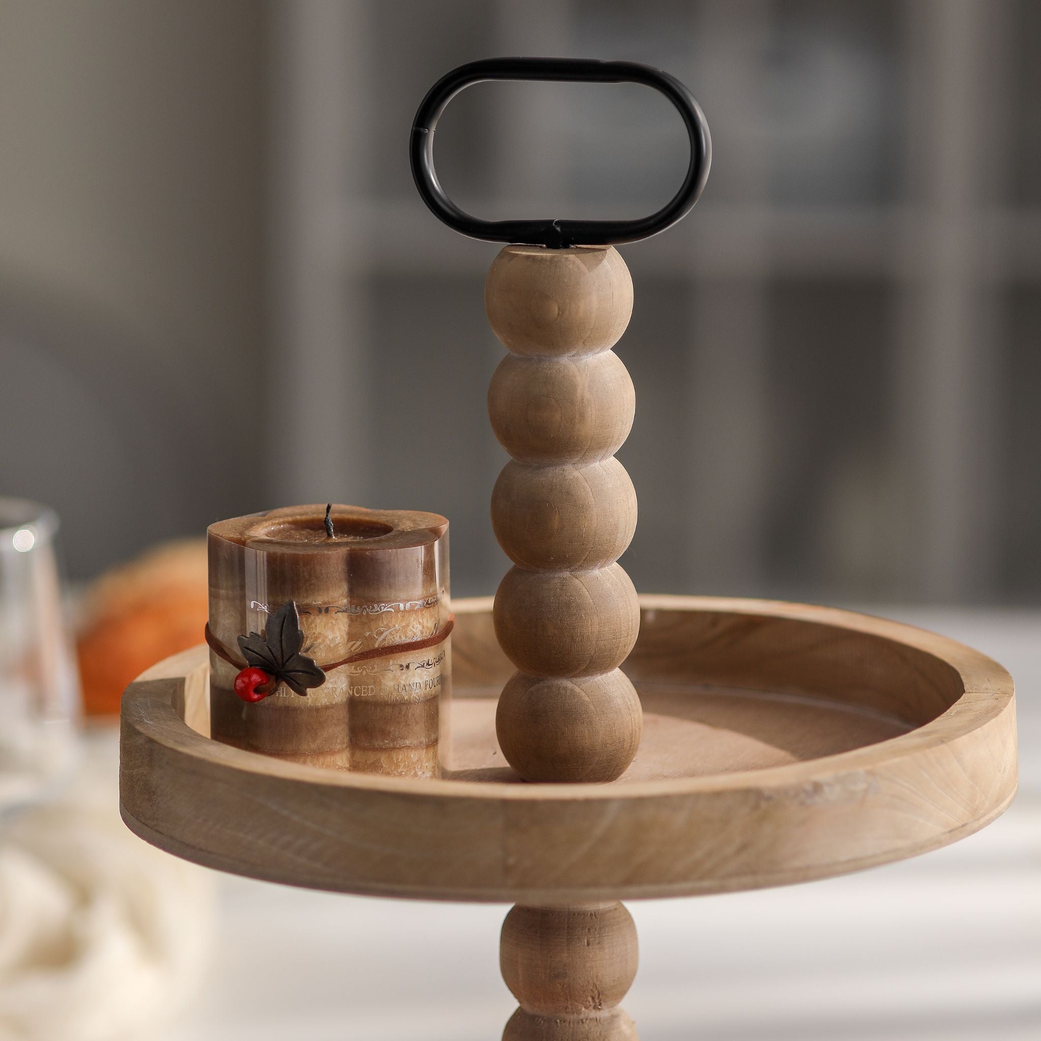 Mallory two tier tray stand upper tray with the black metal oval carry handle.