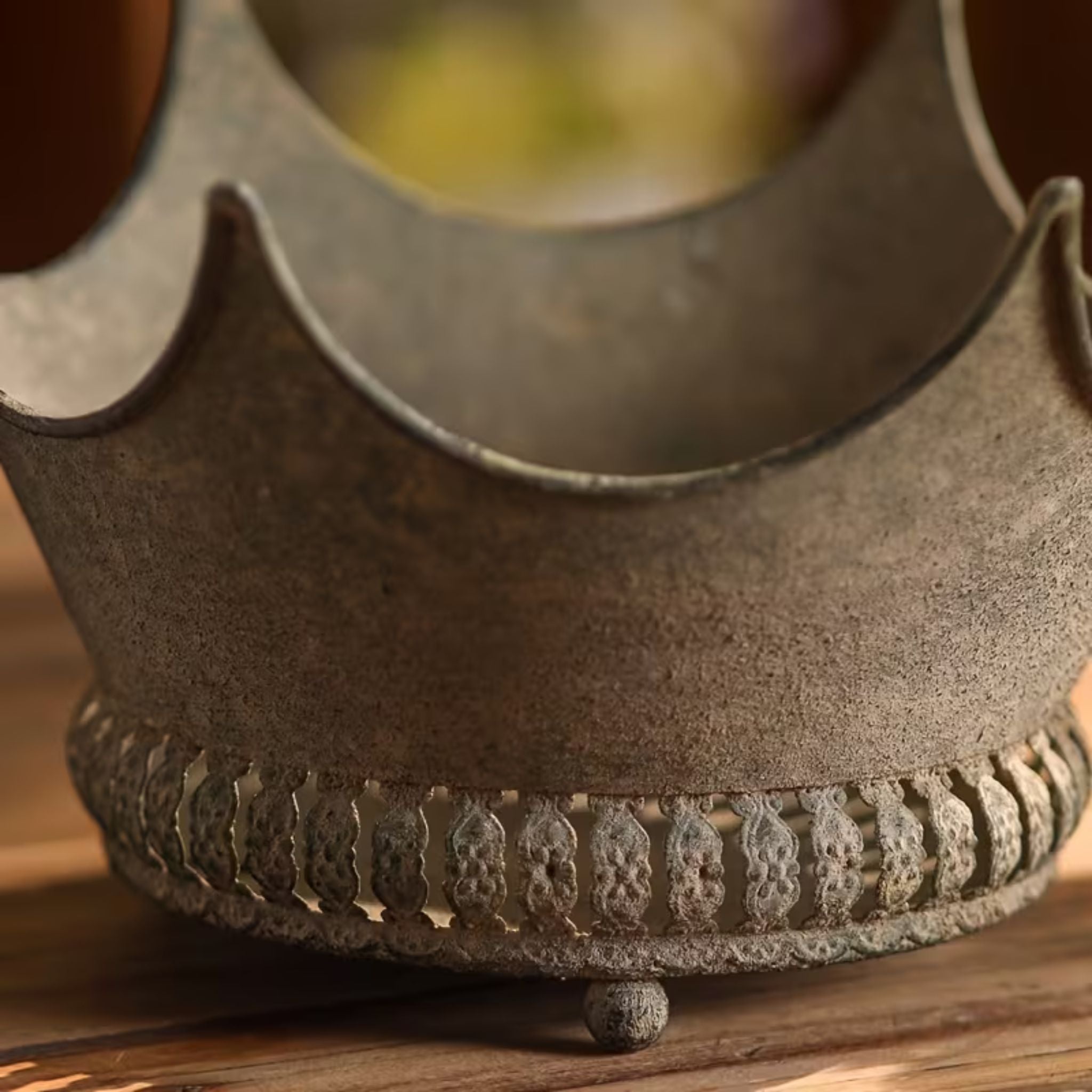 Marlene crown planter close-up of the embossed base band and ball foot