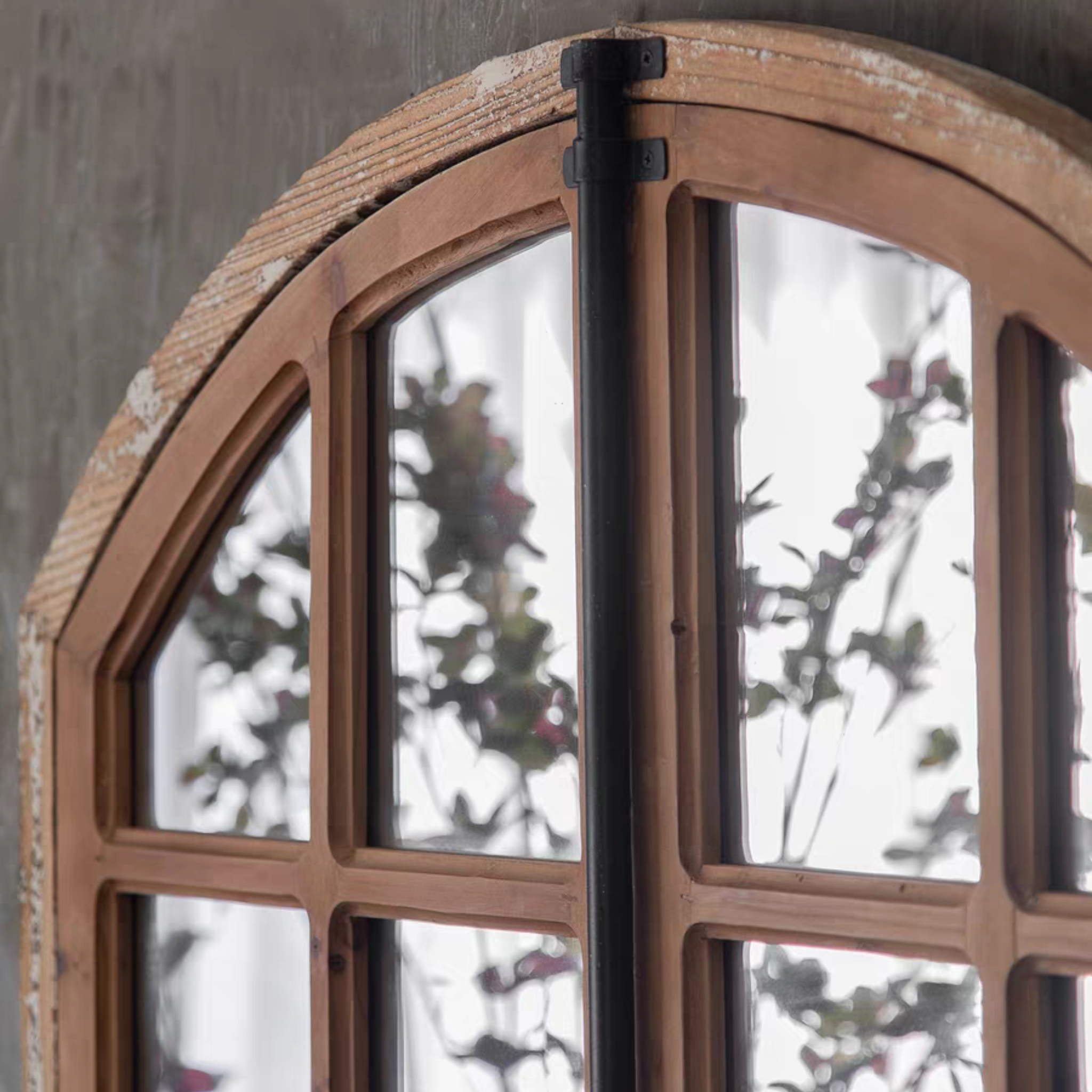 Base bracket detail and natural fir timber sill of the Mathieu window mirror