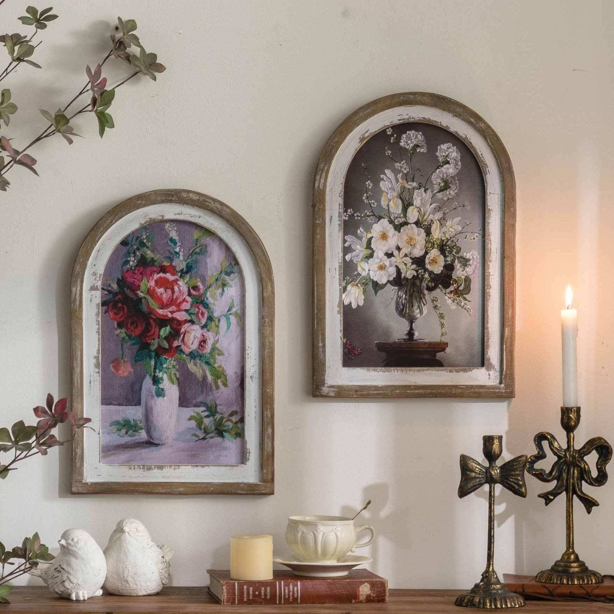 Nadine and its companion arched floral piece styled together on a wall.