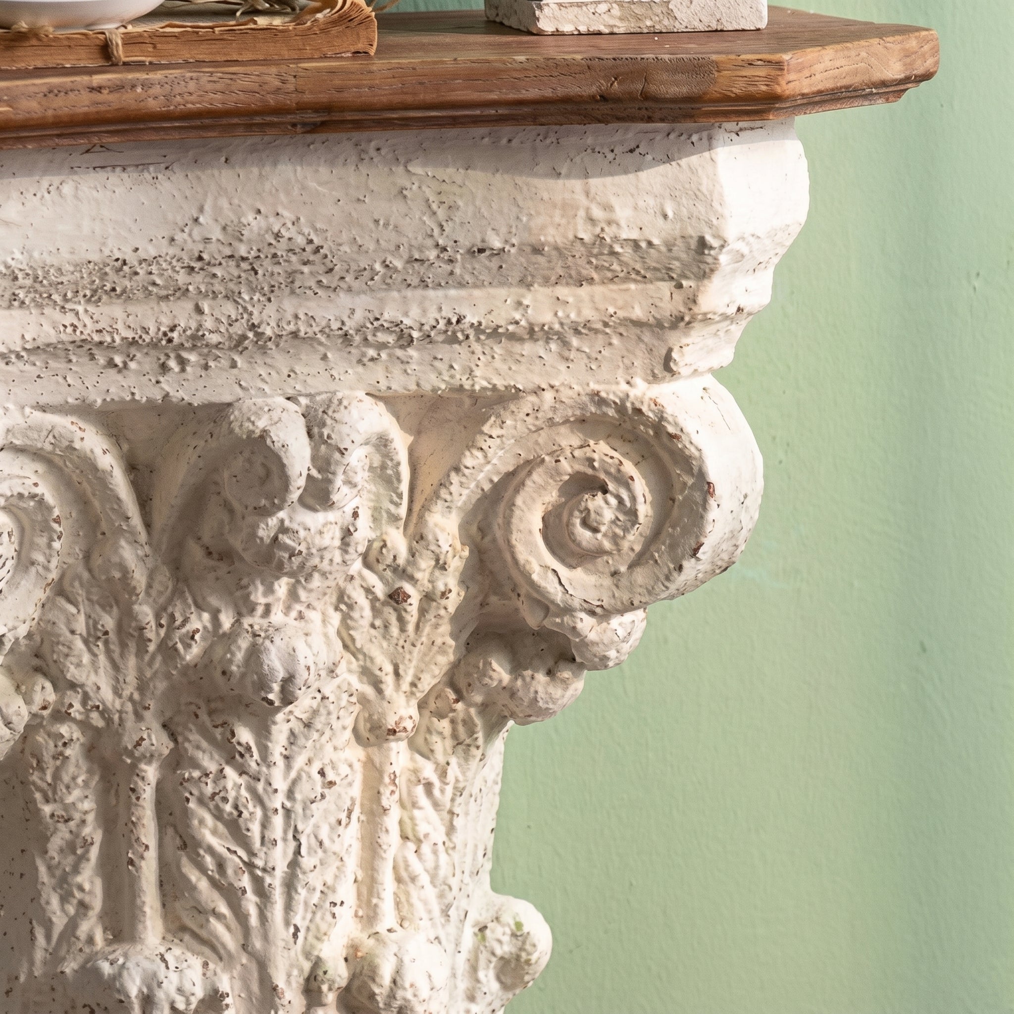 Pauline console table, close detail of the cast Corinthian capital, acanthus leaves and corner scrolls.