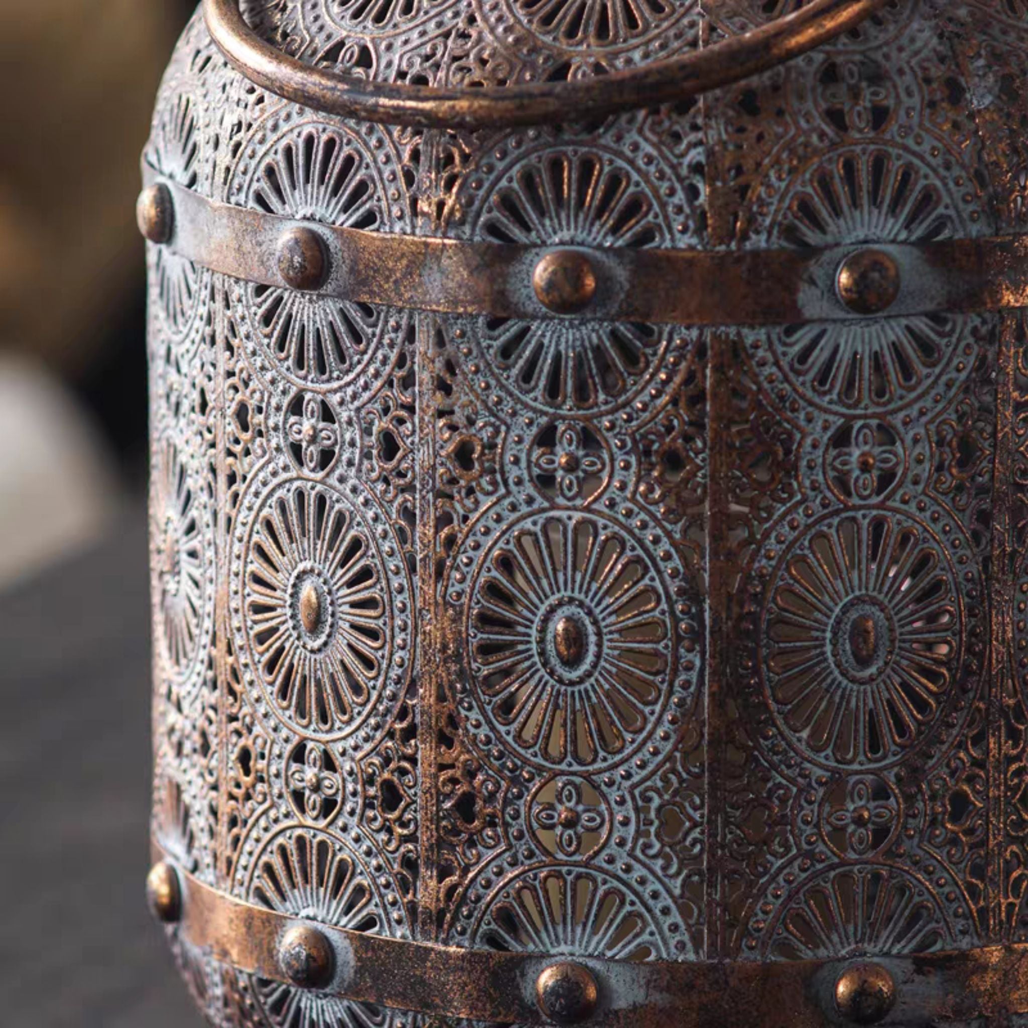 Close-up of the medallion pierced pattern and studded band on the Aicha lantern