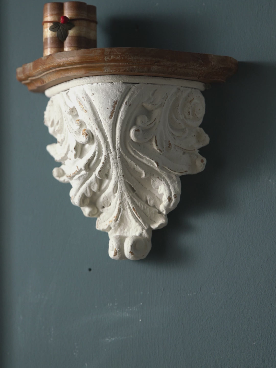 Rosalie and Marguerite French Provincial wall corbel shelves shown on a charcoal wall, demonstrating the carved acanthus and scroll-rosette detail