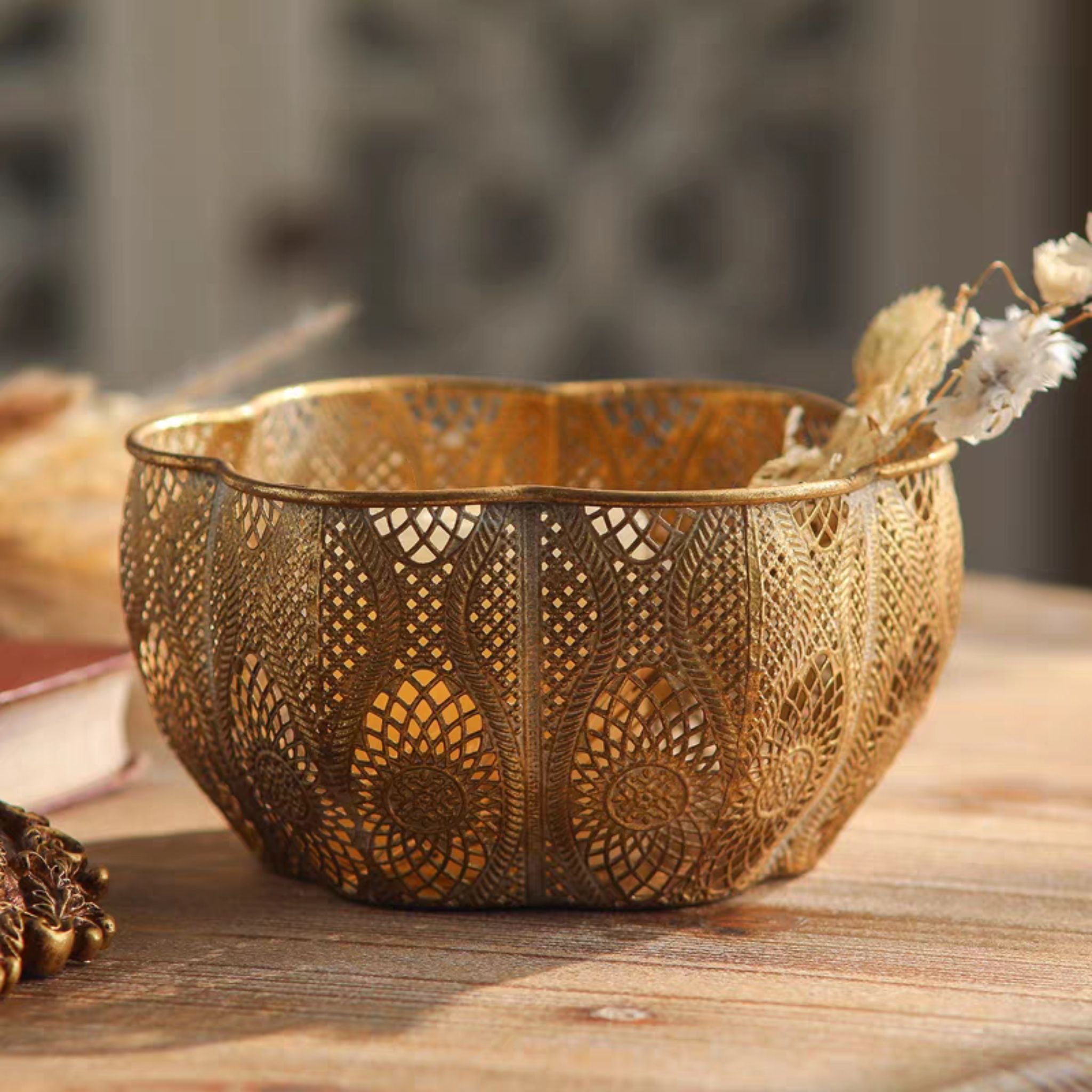 Rosalee pierced metal bowl with light through the lace openwork