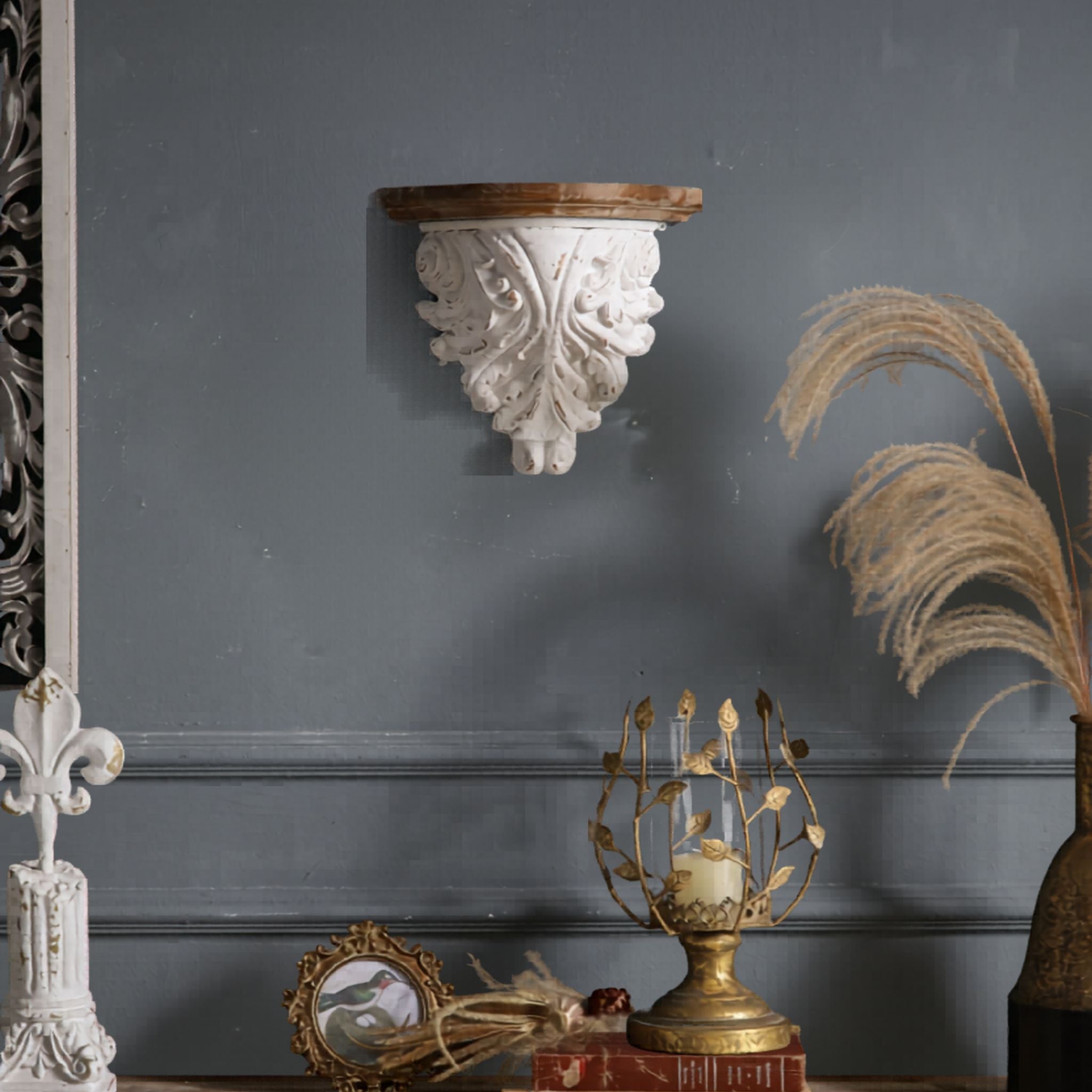 Rosalie acanthus corbel shelf mounted on a charcoal wall, styled alongside dried pampas grass and a fleur-de-lis ornament