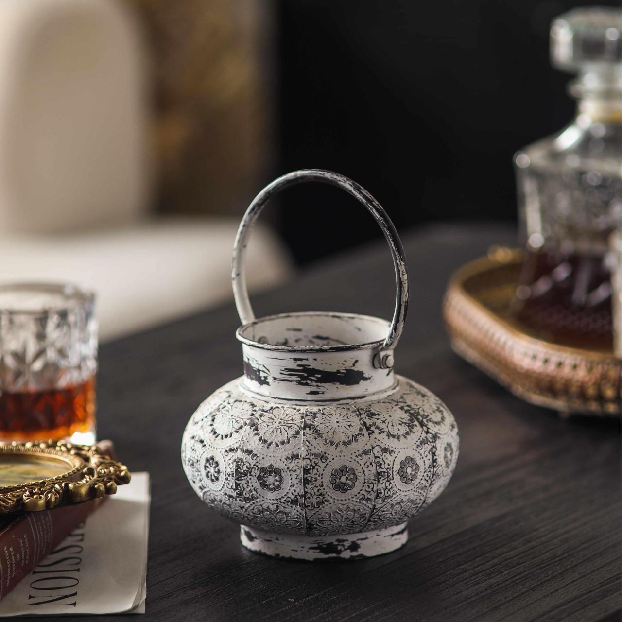 Soraya tea light lantern unlit showing distressed white aged metal finish and embossed pierced pattern