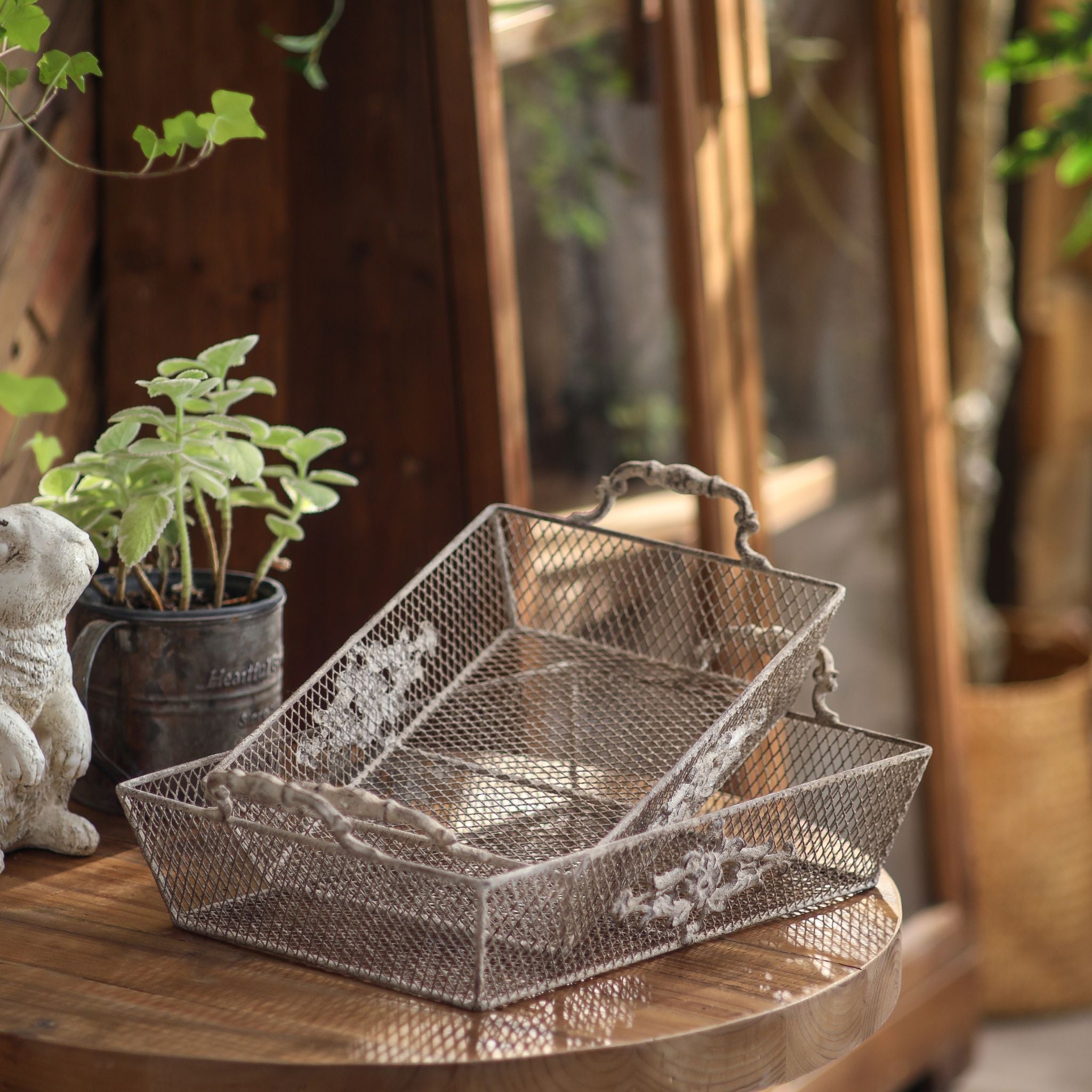 Sylvie French Provincial set of two wire mesh trays with scrolled handles and floral relief in distressed whitewashed grey