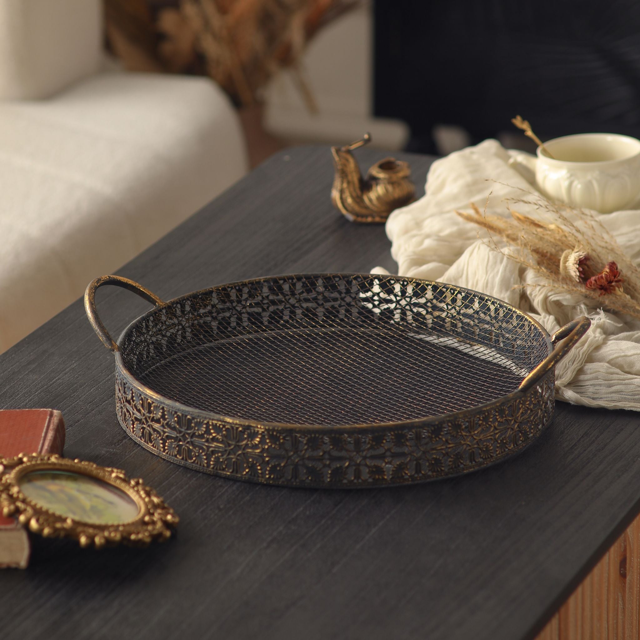 tray-handles.jpgLarger Valerie tray front on, twin looped handles, mesh base, and embossed filigree side band