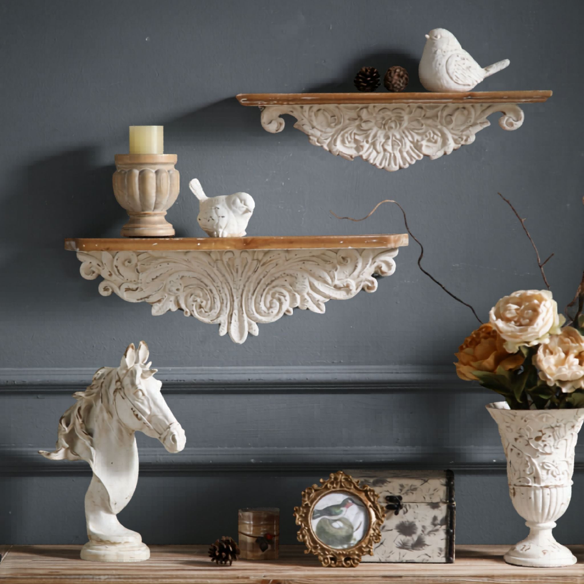 Vanessa wall ledge shelf shown lower position alongside Jennifer smaller wall ledge on upper position, demonstrating staggered wall pair styling